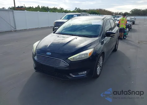 2017 Ford Focus Titanium z USA, uszkodzony, nr VIN 1FADP3N25HL256014
